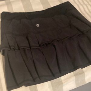 Black Lululemon golf and/or tennis skirt. Great condition. Pleats on backside.